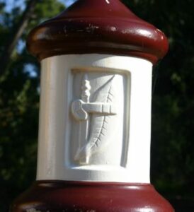 Distinctive brown and white posts are used to mark the rail trail.