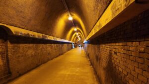 The brick-lined tunnel is a real feature of the trail [2024]