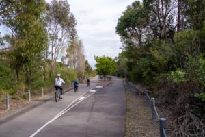 Approaching the former Redhead Station which had a passing loop. Now 'up' and 'down' traffic take opposite sides of the platform [2024]