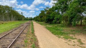 Railway line and upgraded railside trail beyond Atherton [2024]