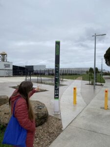 The start of the trail has the 'shadow' of the rail line in the landscaping [2023]