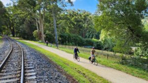 Walkers and cyclists enjoying a new section of trail near Clematis in 2024