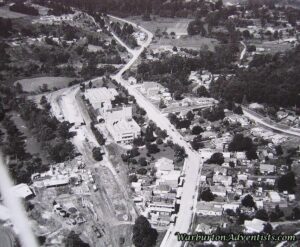 La La Siding on left, Sanitarium factory centre, tramway from Big Pats Creek coming in across road [1930s]