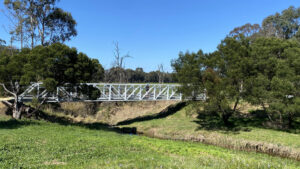 The steel bridge across Eaglehawk Creek opened in 2020 [2025]