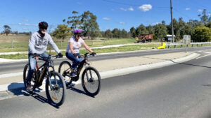 Safer crossing at Cowwarr with restored GY wagon in background [2025]