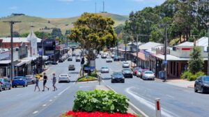 Korumburra main street from the south. Trail car park access is on right [2022]