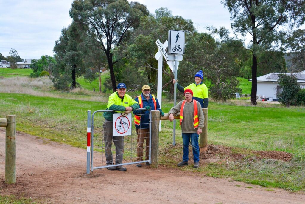 Volunteers work on the O’Keefe Rail Trail