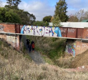 Walking under the southern of the two Victoria St pedestrian bridges [2024]