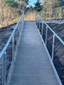 The rail cutting has wheelchair access at several points (2021)